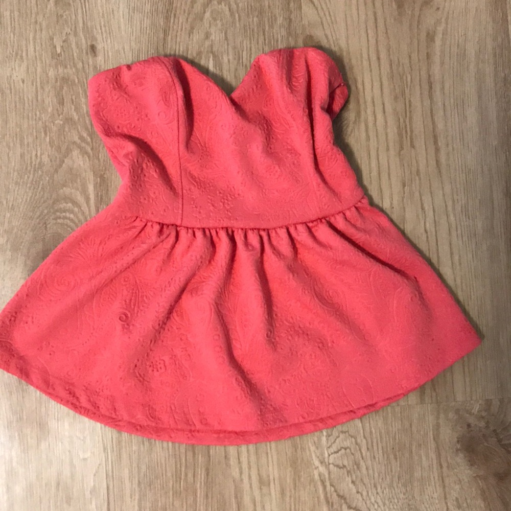 Strapless peplum top